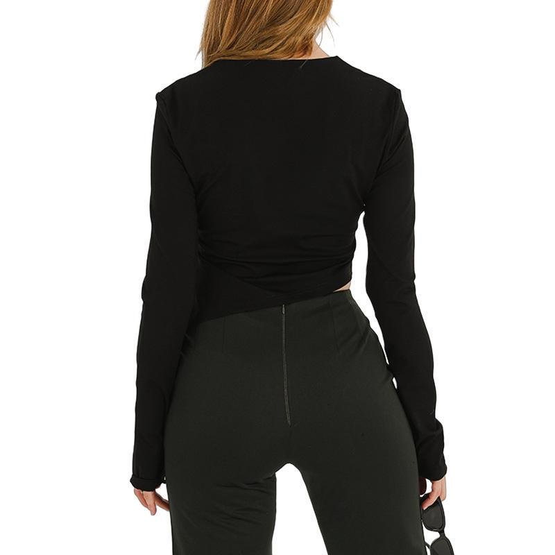 Top corto asimétrico elegante con cremallera 